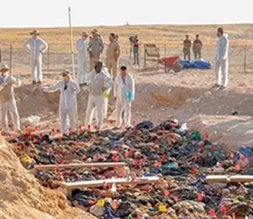 لە گۆڕێكی بە كۆمەڵدا لە موسڵ تەرمی 123 كەس دەرهێنرا