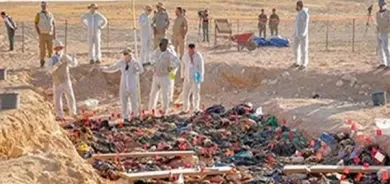 لە گۆڕێكی بە كۆمەڵدا لە موسڵ تەرمی 123 كەس دەرهێنرا