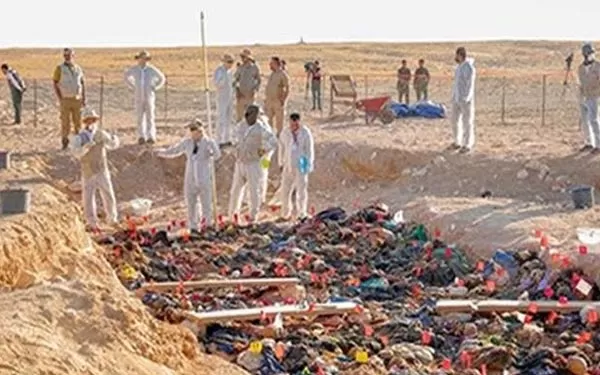 لە گۆڕێكی بە كۆمەڵدا لە موسڵ تەرمی 123 كەس دەرهێنرا