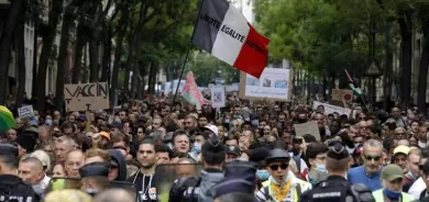 تظاهرات عارمة في باريس واشتباكات بسبب 