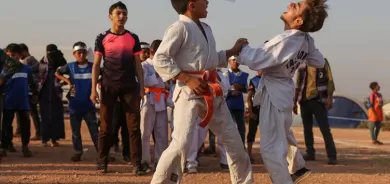 Zarokên Sûrî yên koçber ji xwe re 'Olîmpiyadên Kampan' saz kirin