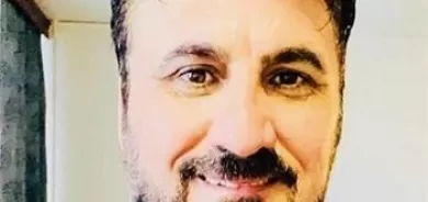 بارزاني مع العلم في بريطانيا