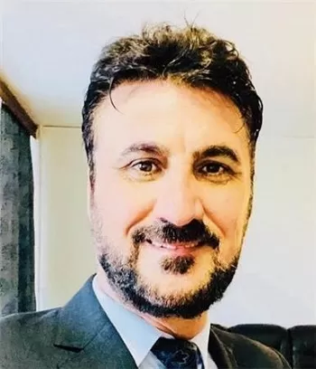 بارزاني مع العلم في بريطانيا