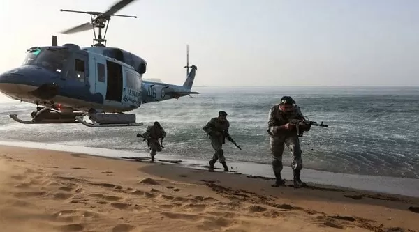 Iran launches military drills near strategic oil lanes