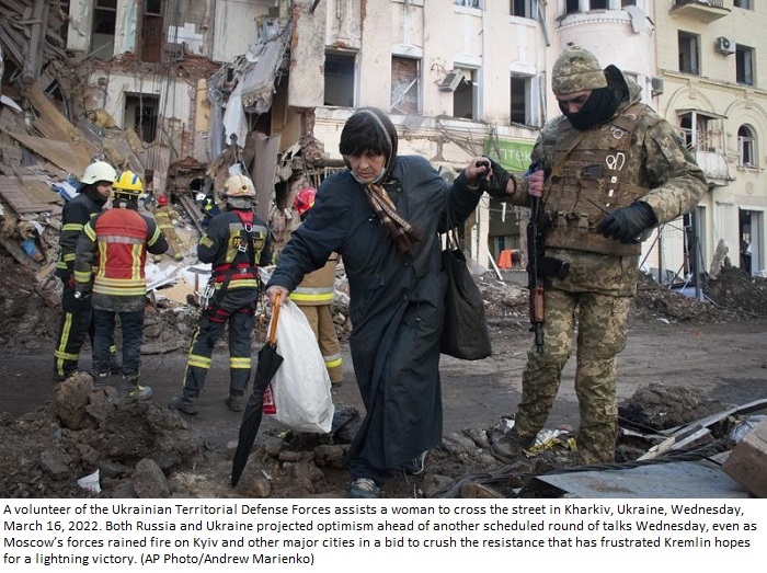 Hundreds feared trapped in Ukraine theater hit by airstrike
