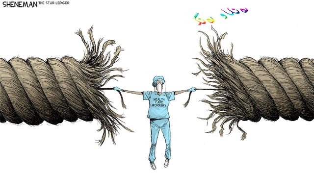 كاریكاتێر  باس لە ماندووبوونی كارمەندانی تەندروستی دەكات