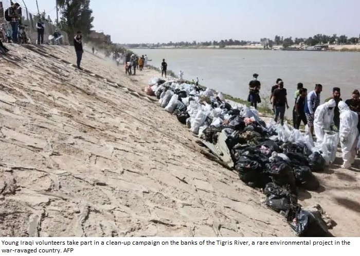 Iraqis clean up river as first green projects take root