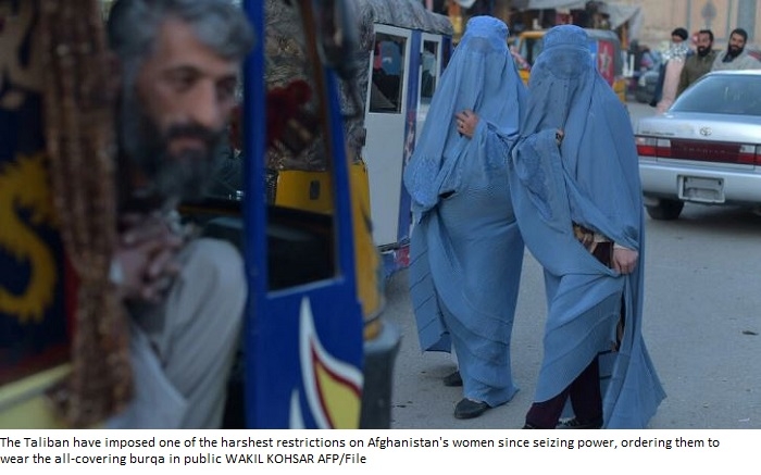 Taliban order Afghan women to wear all-covering burqa