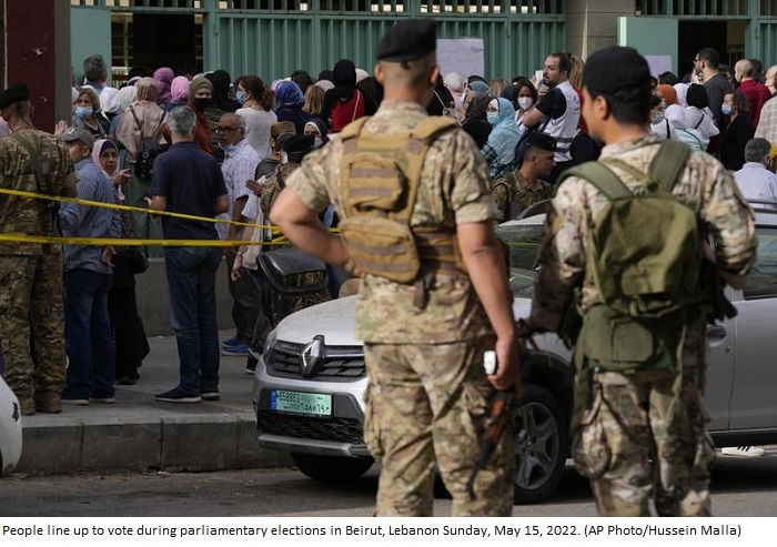 Mired in collapse, Lebanese vote for new parliament