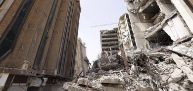 Crowd confronts cleric at Iran tower collapse that killed 32