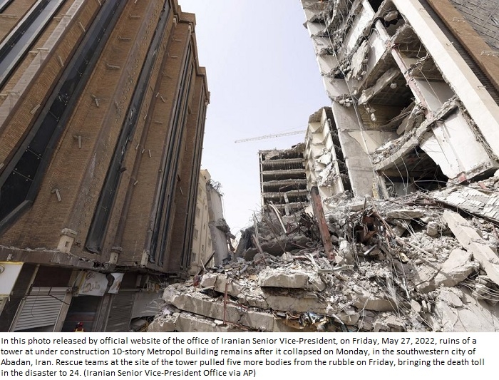 Crowd confronts cleric at Iran tower collapse that killed 32