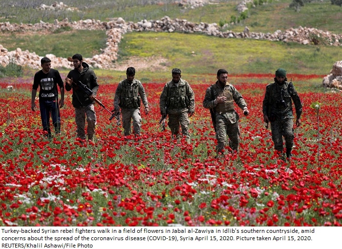 Syrian, Russian forces boosted after Turkey signals operation - officials