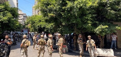 Armed man demanding frozen deposits takes hostages at Lebanese commercial bank