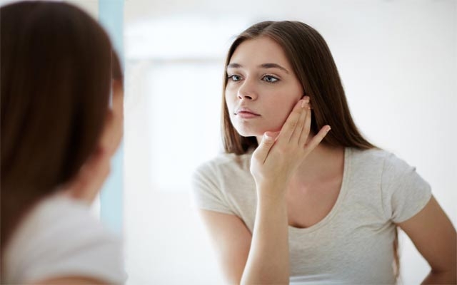 كاریگەرییەكانی تیشكی خۆر لەسەر پێست