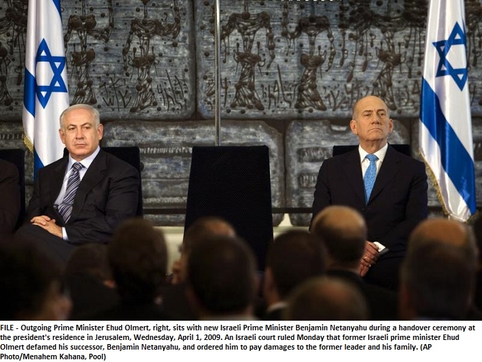 Israeli court rules former PM Olmert defamed Netanyahu