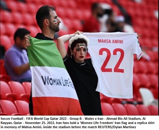 Security escort man wearing pro-Iran protest shirt ahead of match