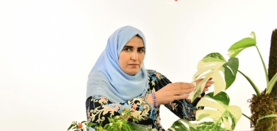 بەهرە و كارامەیی ئافرەتێك   لە گوڵ فرۆشتن