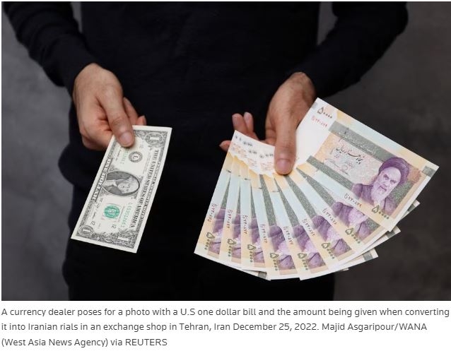 Iran's currency slides to record low as savers buy dollars