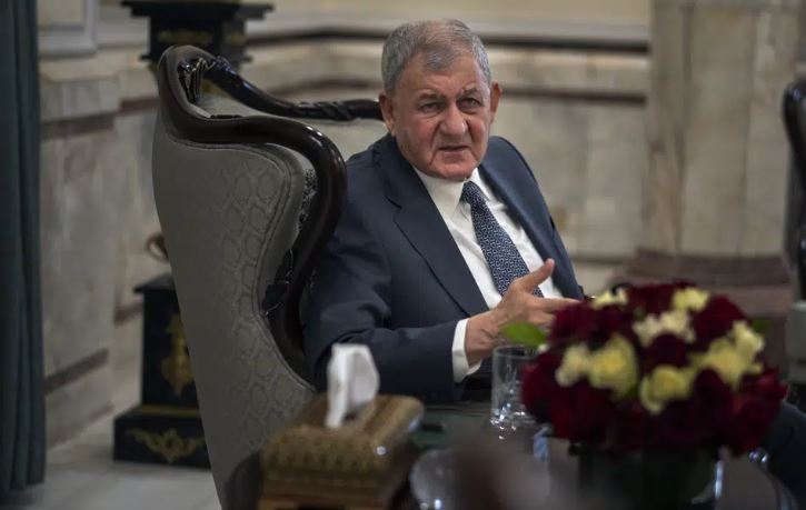 Iraqi president says country now peaceful, life is returning