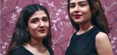 After IS and bombs, refugee sisters sing of Kurdish sorrow