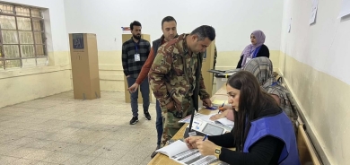 Iraq's Provincial Elections Commence Amidst Technical Glitches and UN Absence