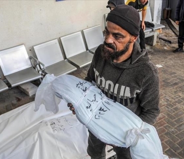 ژمارەی قوربانیانی هێرشەکانی ئیسرائیل بۆ سەر غەززە گەیشتە ٢٢ هەزار و ٣١٣ کەس