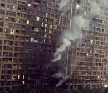 كەتنەوەی ئاگرێك لە بینایەكی نیشتەجێبوون