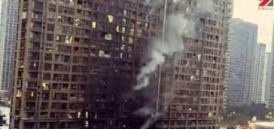 كەتنەوەی ئاگرێك لە بینایەكی نیشتەجێبوون