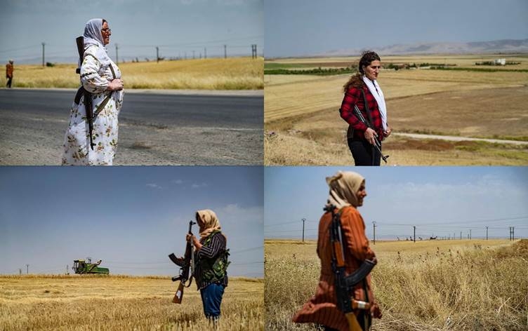 ROJAVA - Jin ji ber tirsa şewitandinê li ber zeviyên genim nobetê digirin