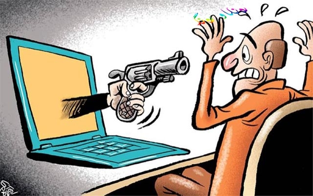 كاریكاتێر،  ئەم كاریكاتێرە باس لە ترسناكی ئینتەرنێت و كۆمپیوتەرەكان دەكات