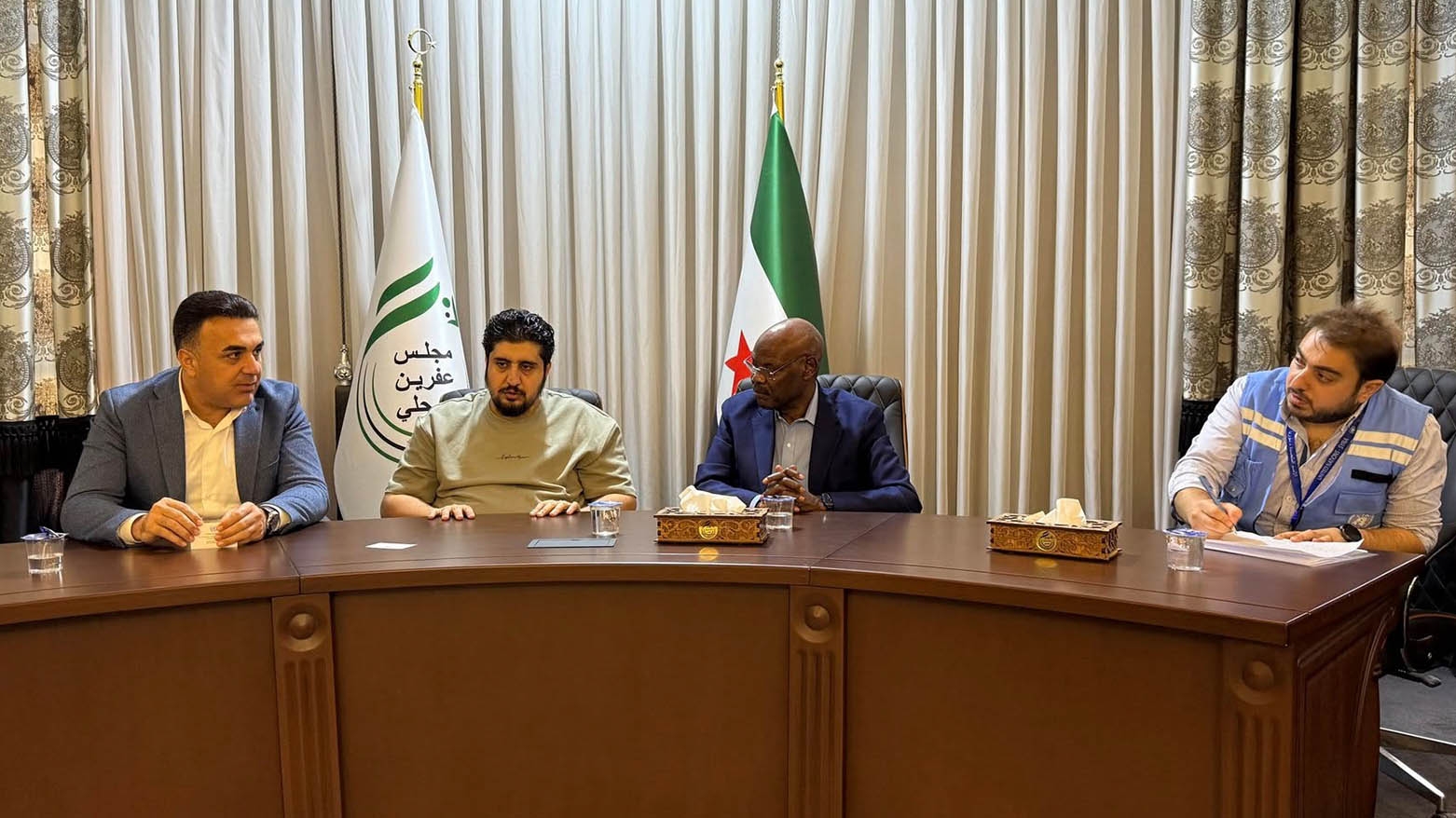 Şandeke NY li Efrînê ye: Li rewşa koçberên vegeriyayî û pêdiviyên bajêr dipirse