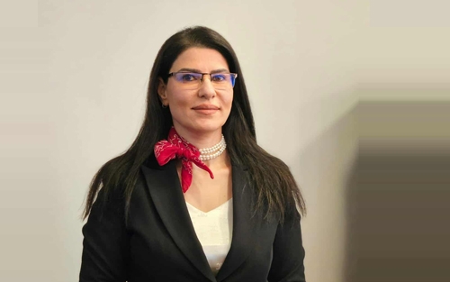 ڕۆڵی ئافرەت لە بەرقەرارکردنی هاوسەنگی و هاوبەشی و سازان