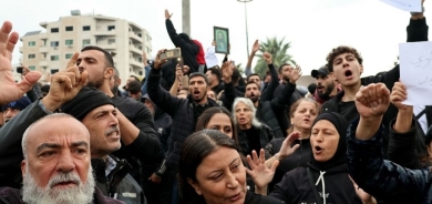 Syria's Alawite Leader Calls for Mass Protests Demanding Federalism After Homs Mosque Attack