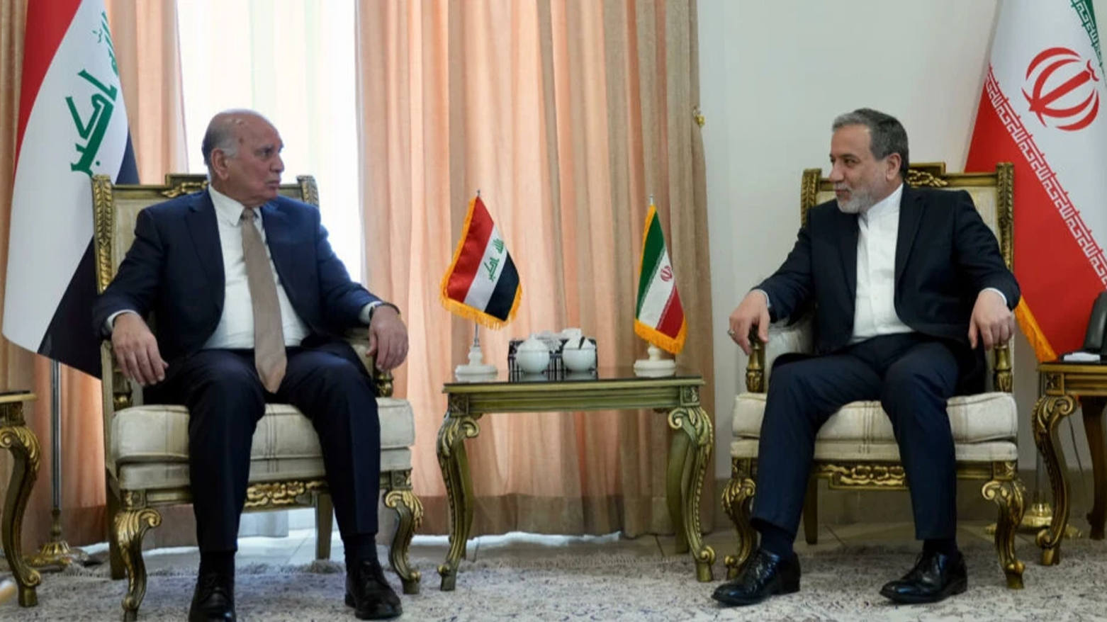 وزيرا خارجية العراق وإيران يبحثان جهود التهدئة والوساطة الباكستانية