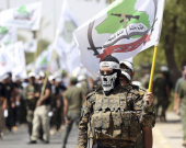 عێراق لە نێوان نەبوونی هەڵوێستی فەرمی دەوڵەت و بڕیاری ئاشكرای میلیشیاكاندا