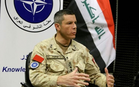 قائد بعثة الأطلسي إلى العراق يصف العنف في الاحتجاجات ب