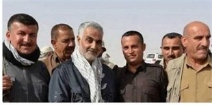 التلفزيون الايراني يبث صورة لقائد فيلق القدس الى جانب عناصر من البشمركة