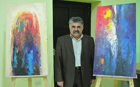 فنان كوردي يعلم الاطفال اللاجئين في المانيا على الرسم