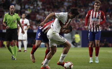 أتلتيكو مدريد يعبر هويسكا بثلاثية في 