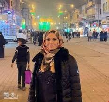  إلهام شاهين بالحجاب في بغداد لأول مرة