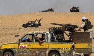 المجلس الانتقالي في ليبيا يعلن السيطرة على معاقل للقذافي في الصحراء