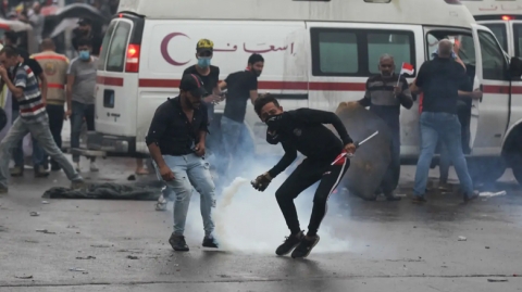 عشرات القتلى باحتجاجات تخللها عنف في بغداد ومدن الجنوب