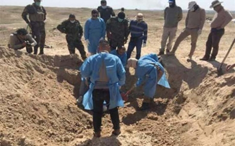 مقبرة جماعية شمال الموصل تضم رفات 18 إمرأة وطفل