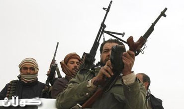 القذافي يندد بعقوبات الامم المتحدة ويقول انه سيسحق المتمردين