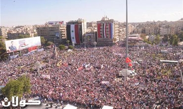 مظاهرة مؤيدة للاسد في حلب وليبيا تعترف بالمعارضة السورية