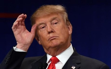 واشنطن بوست: 14 مساعدا لترامب يتخابرون مع روسيا