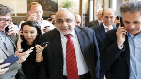 السنة يتمسكون بحقيبتي الدفاع والمالية