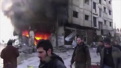 Syrian forces 'kill dozens' in barrel bomb attack