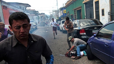 Clashes, Tear Gas After Police Kill Boy at Venezuela Protest