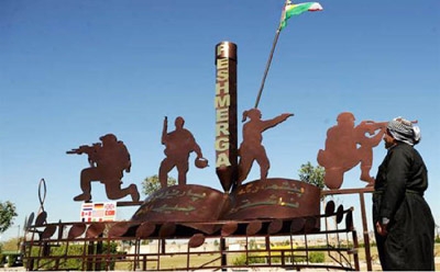 A Kurdish Artist in Netherlands builds a statue for Halabja Anniversary on his room's door